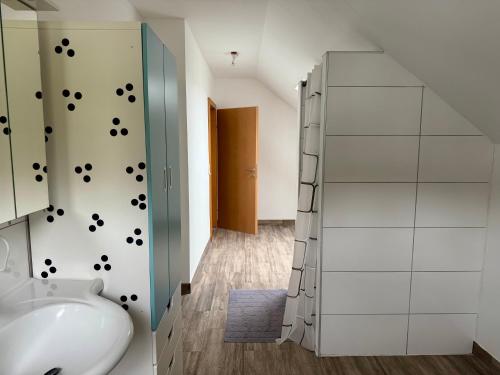 a bathroom with a sink and a shower at Das Holzhaus in Haidershofen