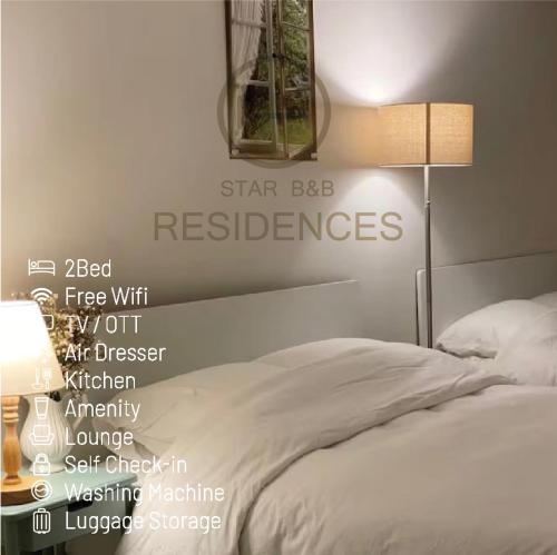 a bedroom with a bed with a sign on the wall at Little Suite Daegu-Central Residential Hotel in Daegu