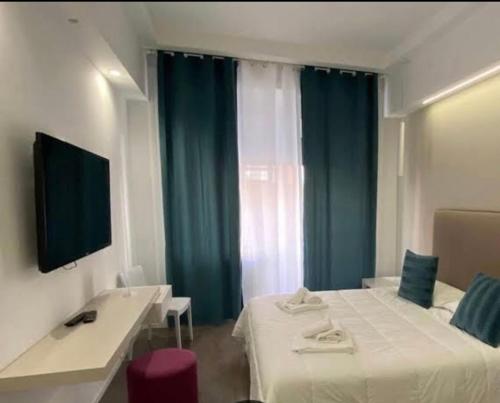 a hotel room with a bed and a window at Primo Piano in Sparano in Bari