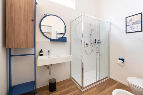 a bathroom with a shower and a sink at Ospitalità Il Prato in Iesi