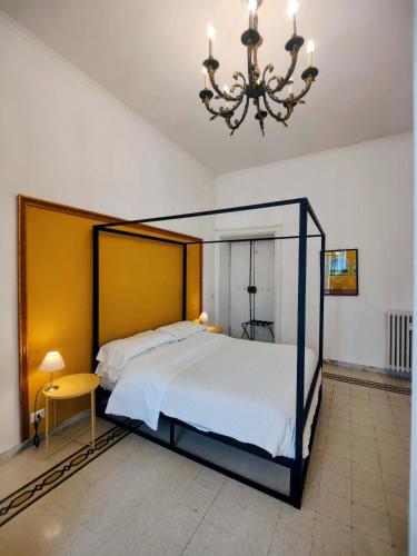 Säng eller sängar i ett rum på AcB Vaticano Suites