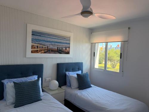 Stylish Frontline Punta Prima Suite with Sea Views