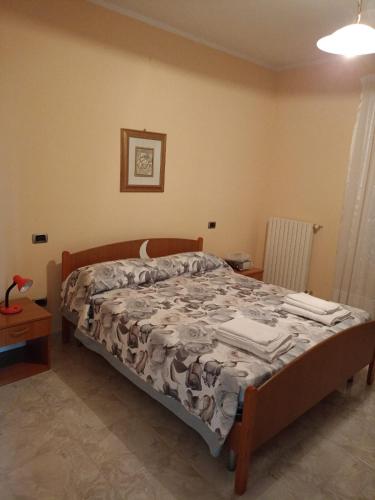 a bedroom with a bed in a room at Masseria Sant' Anna in Cerreto Sannita