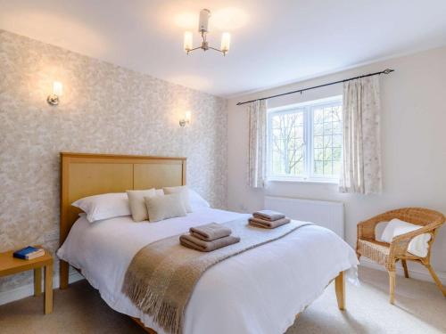 a bedroom with a large bed and a window at 3 Bed in Stepaside oc-fb047 in Stepaside
