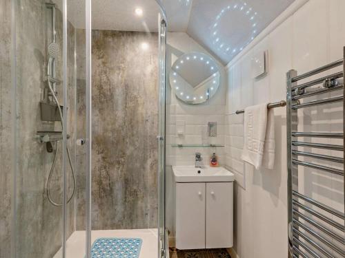 a bathroom with a shower and a sink at 2 Bed in Craven Arms oc-83166 in Clun