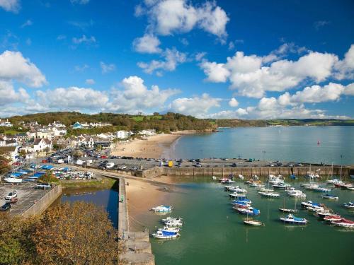 a bunch of boats are docked in a harbor at 2 Bed in Saundersfoot oc-74356 in Saundersfoot