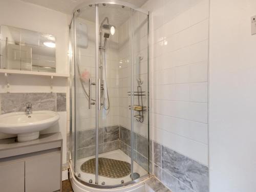 a bathroom with a shower and a sink at 2 Bed in Mold oc-90461 in Caerwys