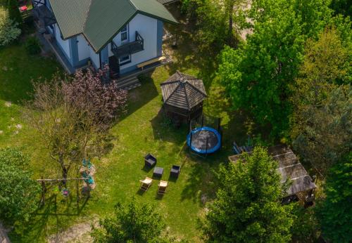 an overhead view of a backyard with a gazebo at Agroturystyka Pod Lasem na Roztoczu in Sochy