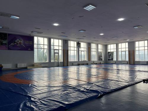 a large empty room with a dance floor at Arena Hotel Tovuz in Tovuz