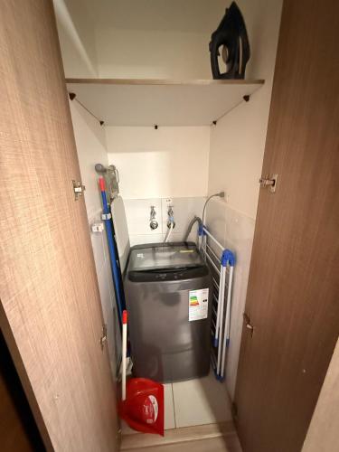 a small bathroom with a toilet in a room at Ivan Suite More than accommodation an experience in Santiago