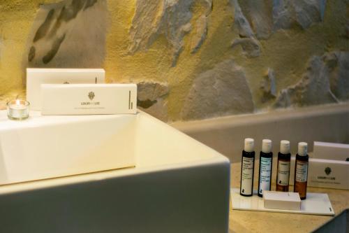 a group of batteries sitting on top of a table at Exensian Villas & Suites in Marathias