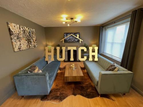 a living room with a couch and a coffee table at No50 - 2-bed Boutique Apartment - Hosted by Hutch Lifestyle in Leamington Spa