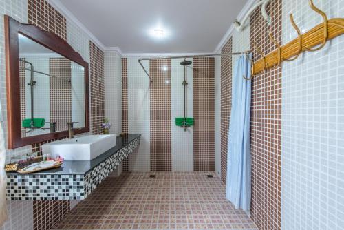 Un baño de Delux Villa