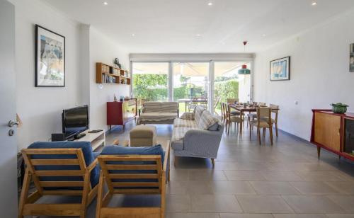 a living room with a couch and chairs and a table at C12 - Sunshine Apartment in Luz in Luz