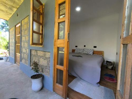a bedroom with a bed in a room at Mizpah House in Kikuyu