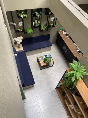 an overhead view of a lobby with potted plants at Loft 32 Medellín Living in Medellín
