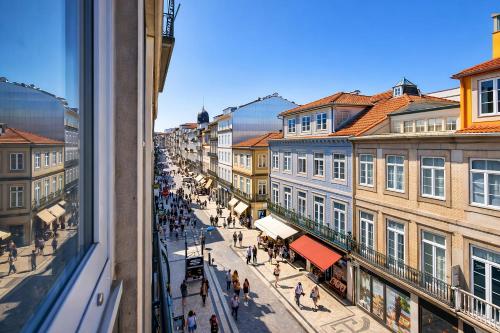 a view of a city street from a window at FindMe InPorto Santa Catarina in Porto