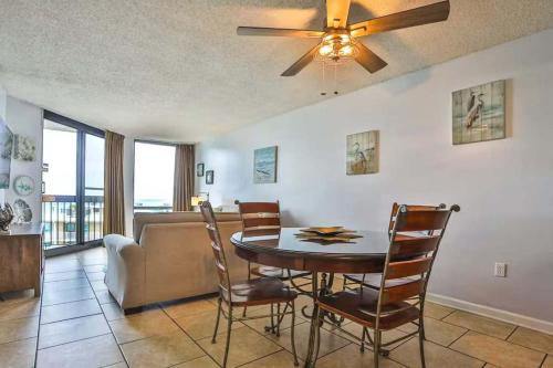 a living room with a dining room table and a ceiling fan at SunDestin Resort Unit 0615 in Destin