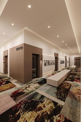 a large room with a rug on the floor at Gradska Palača - BOSANA Hotel & Spa in Bihać