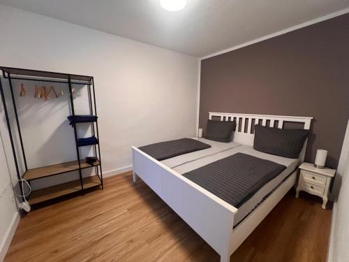 a bedroom with a bed and a ladder in it at Apartment Rosenberg in Klotten