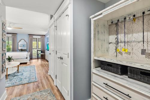 a hallway with a living room and a bedroom at Grand Sandestin 2210 in Destin