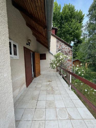 a walkway leading to the door of a building at Balatonlak in Ábrahámhegy