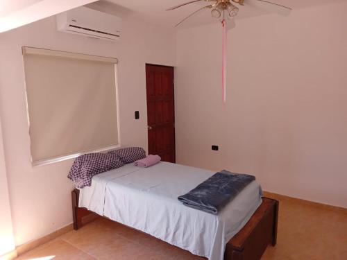 a small bedroom with a bed in a room at SN2 Loft for 2 people, private bathroom in Monterrey