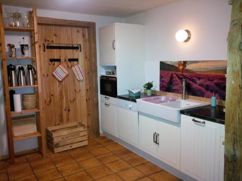 Η κουζίνα ή μικρή κουζίνα στο Ferienhof Idyll am kleinen Fließ