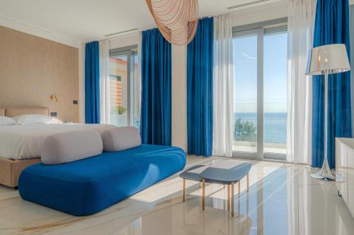 Llit o llits en una habitació de Hotel Villa Levi