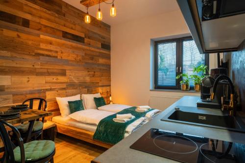 Postel nebo postele na pokoji v ubytování Babina Loft