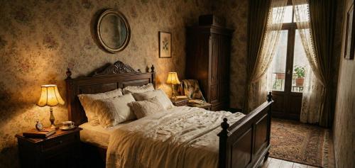 a bedroom with a bed and two lamps and a window at Kule Rezidance Hotel in Seyhan