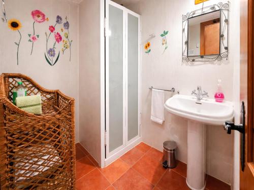 a bathroom with a sink and a shower at Medieval country house Señorío de Montero in Cenizate