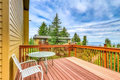 a wooden deck with a table and chairs on it at Mountain Retreat Slope Access 2 Decks in Boise