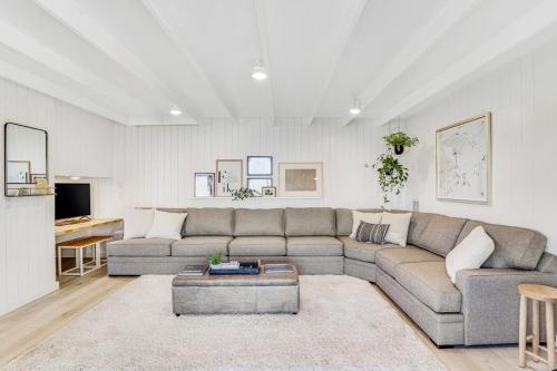 a living room with a couch and a table at Ski-In Ski-Out Studio at Bogus Basin in Boise