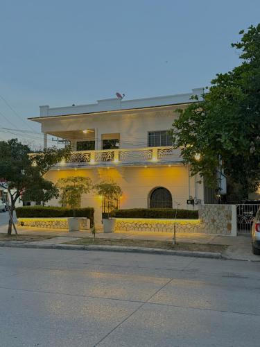 a white building on the side of a street at suites Casa Blanca in Ciudad Valles