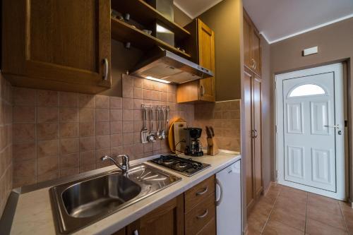 O bucătărie sau chicinetă la Villa Lugano
