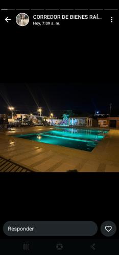 a picture of a parking lot at night at Newly Opened Mini Suite in Manta