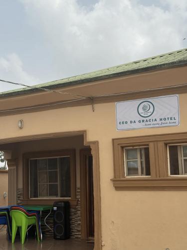 a building with a sign on the side of it at CEO Da Gracia Hotel, Irewon, Ijebu Ode in Ijebu Ode