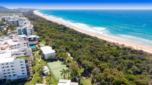 an aerial view of a beach and buildings at Seashells - 3BR Marcoola Beach Resort in Marcoola