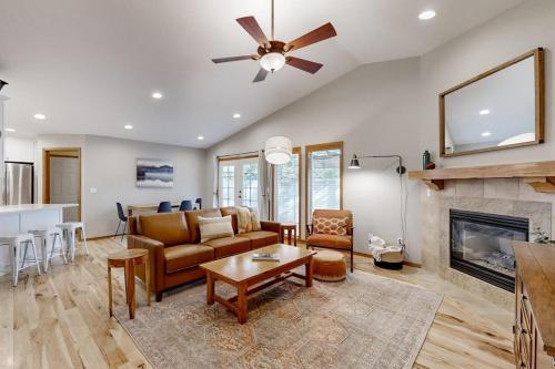 a living room with a couch and a fireplace at Warm & Inviting in Boise
