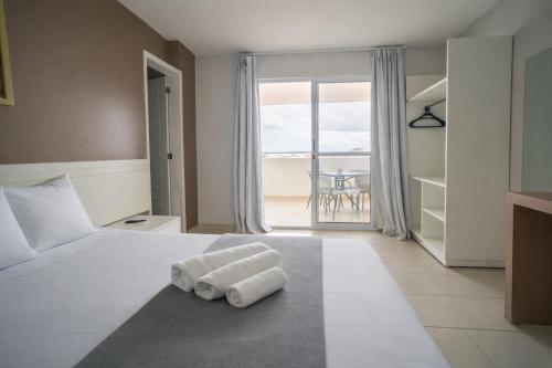 Llit o llits en una habitació de Hotel Rochedo, Penedo - Alagoas