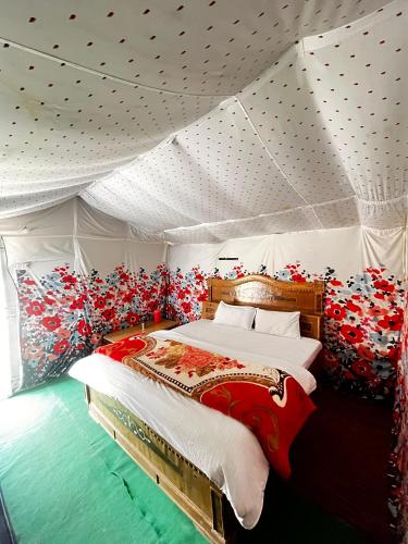 a bedroom with a bed in a tent at Mayadeep Resort and Hostels in Chopta