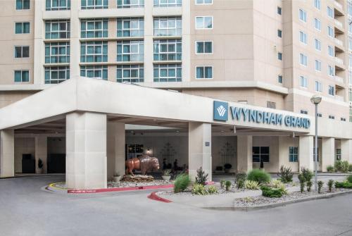 a view of a building with a large building at Wyndham Grand Oklahoma City Downtown in Oklahoma City