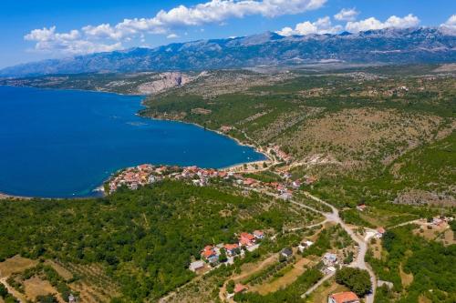 an aerial view of a village and a lake at Antonija in Bašić