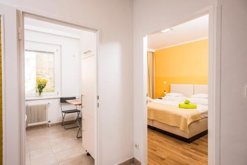 Postel nebo postele na pokoji v ubytování Appartements Ferchergasse