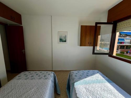 Apartment con piscina y parking a 600m de la playa, 2 habitaciones