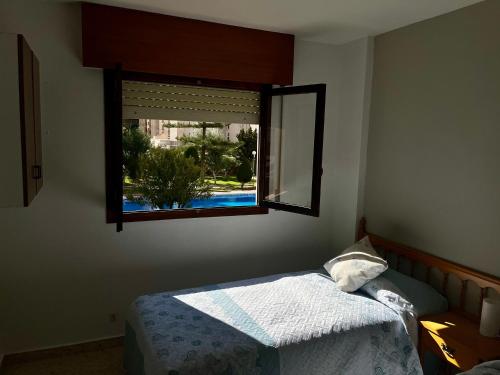 Apartment con piscina y parking a 600m de la playa, 2 habitaciones