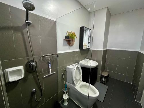 a bathroom with a toilet and a sink at Casita Luna in San Juan