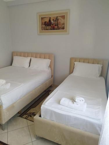 Katil atau katil-katil dalam bilik di Aldi Summer Apartment