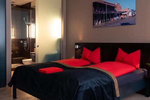 Postel nebo postele na pokoji v ubytování Hotel Quers Inn
